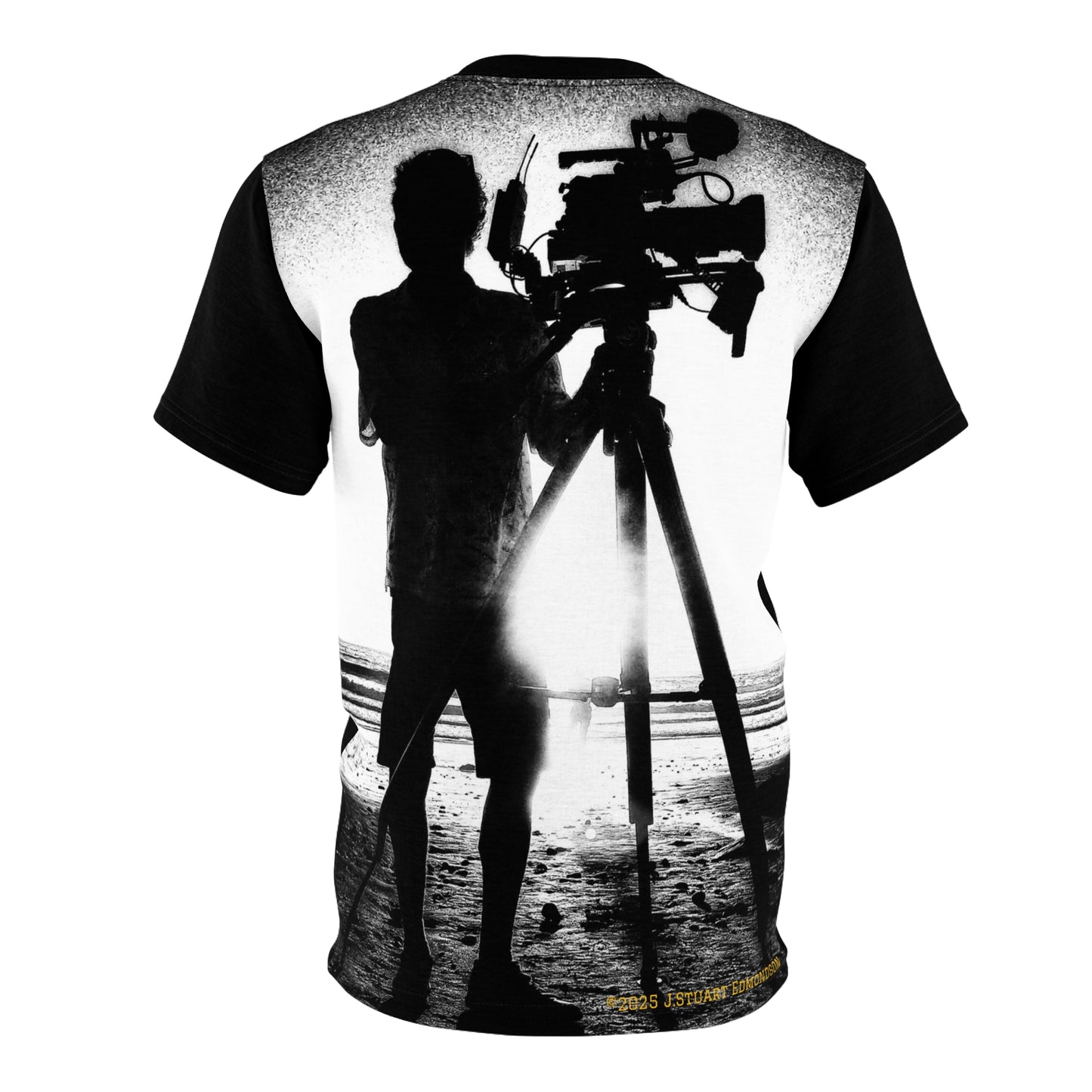 T-shirt with a black and white graphic of a person filming on a beach.